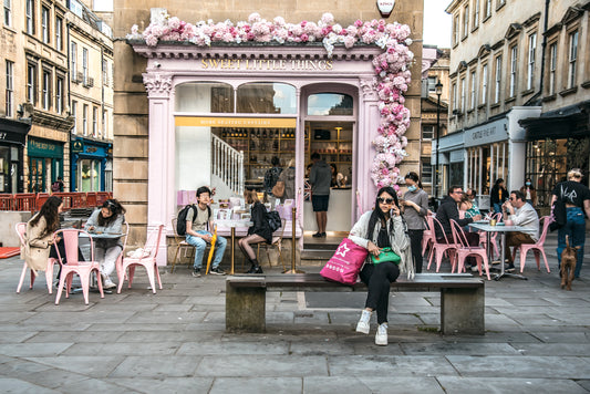 Sweet Little Things Cafe in Bath, UK, where patrons enjoy a cup of tea and cakes